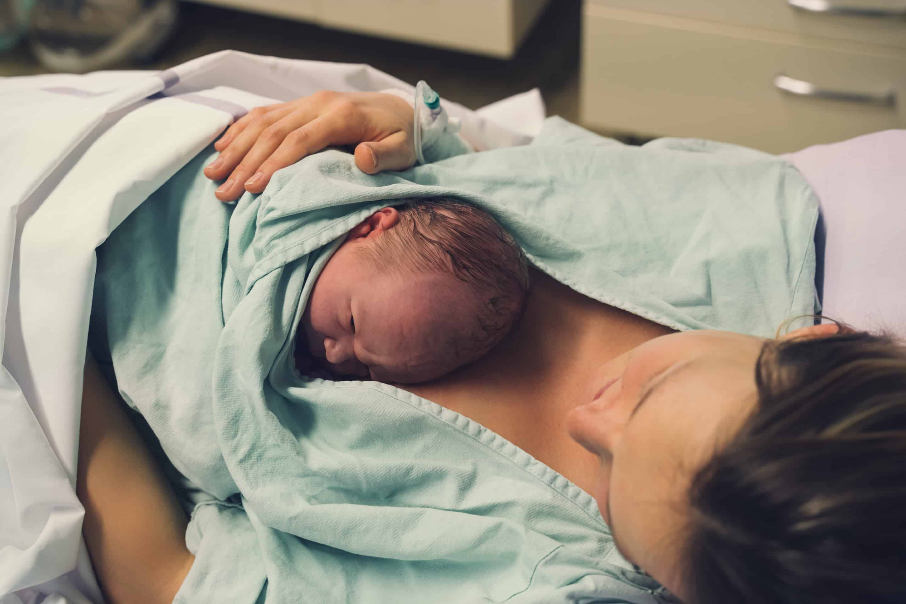 mother and newborn child after birth